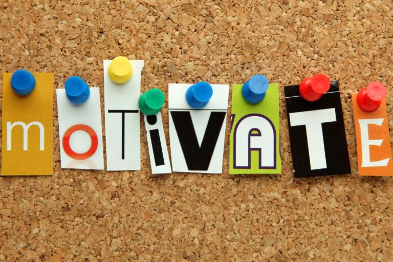 Motivate spelled in cutout magazine letters