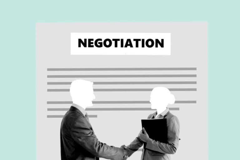 Negotiation, two people shaking hands as successful negotiators