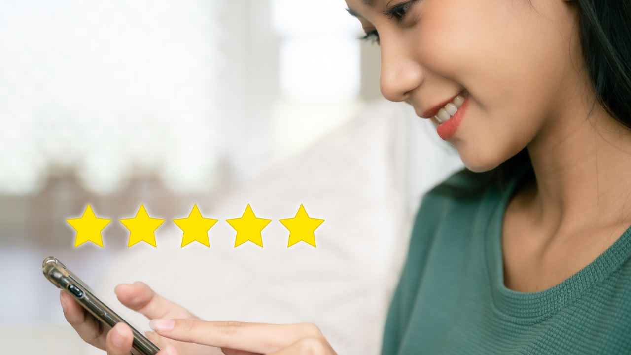 Asian woman Gives Five stars to Customer Service Superstar
